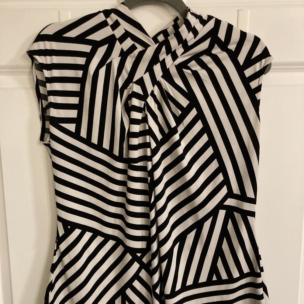 Black and white stripped sleeveless blouse
